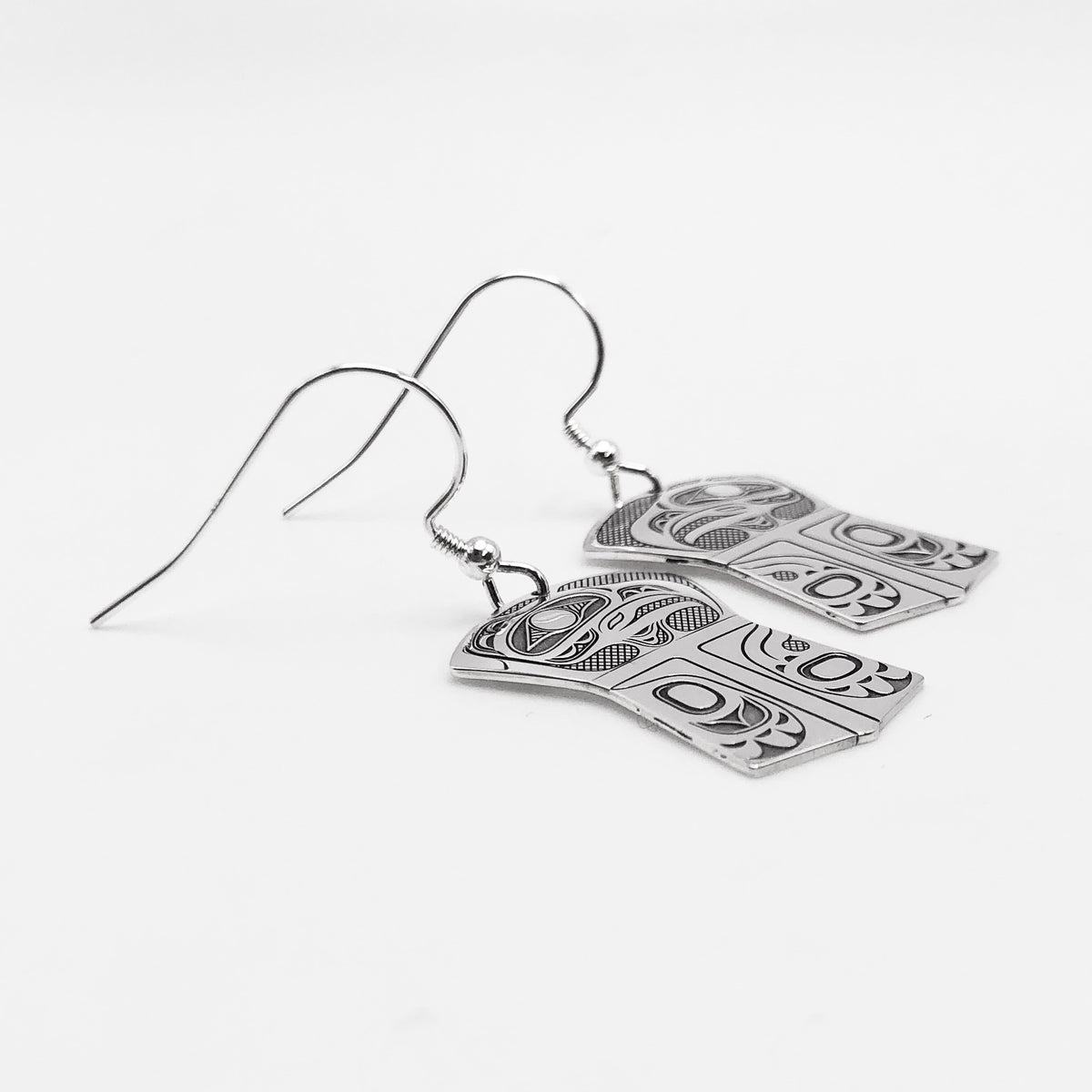 Boucles d'oreilles en cuivre avec bouclier d'aigle