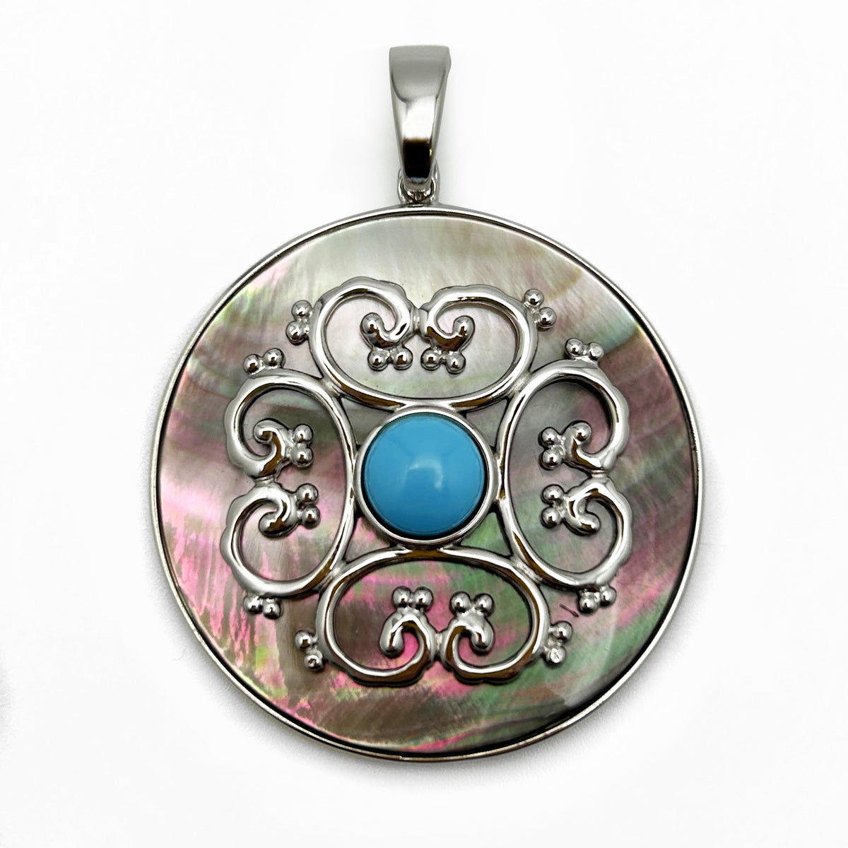Pendentif en nacre noire et turquoise
