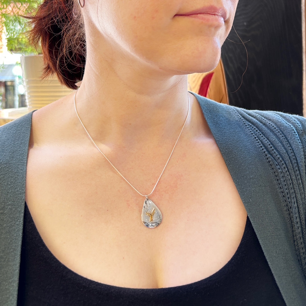 Pendentif queue de baleine