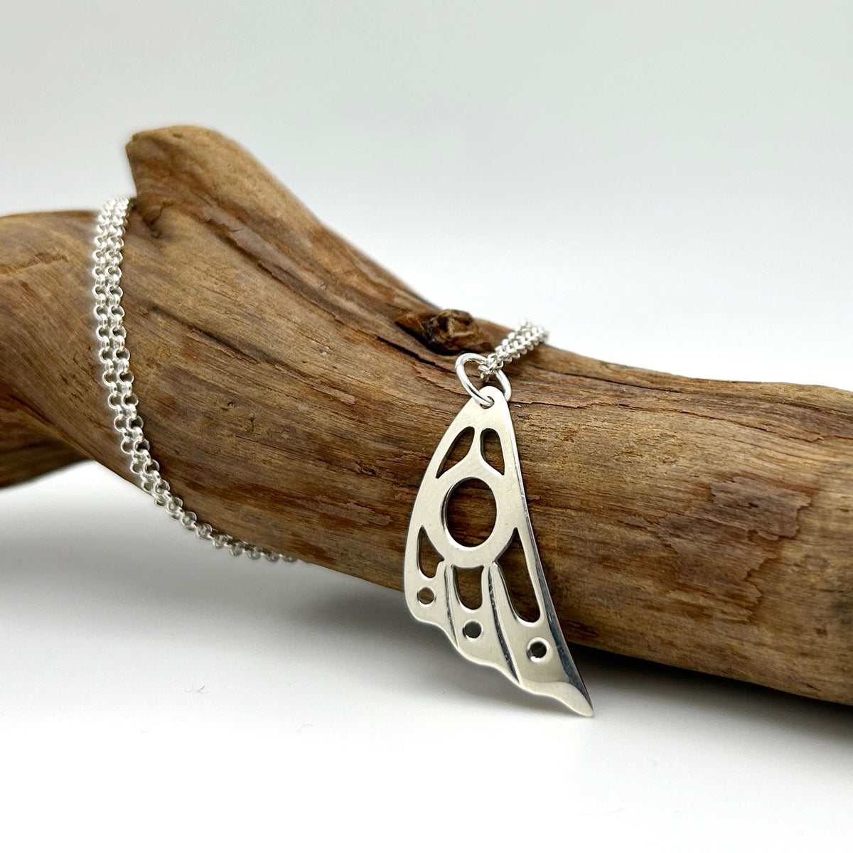 Pendentif en plumes de colibri