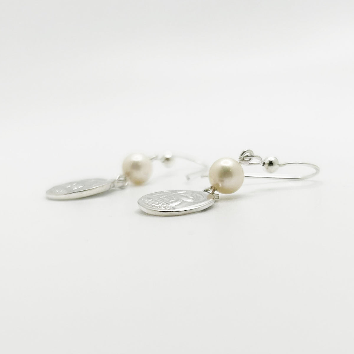 Boucles d'oreilles orque