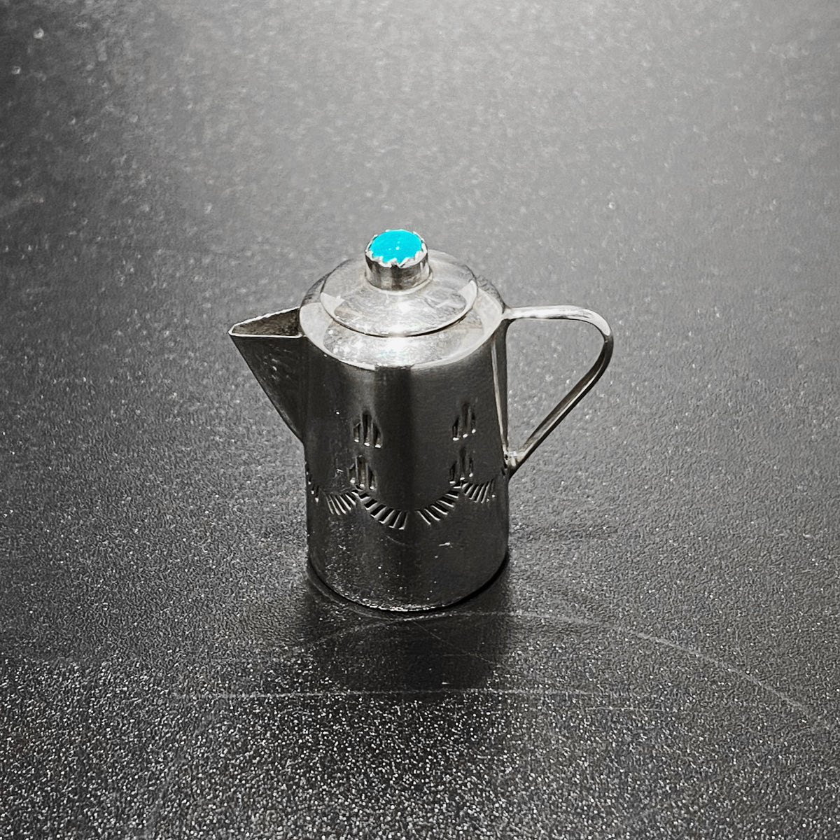 Cafetière miniature turquoise argentée