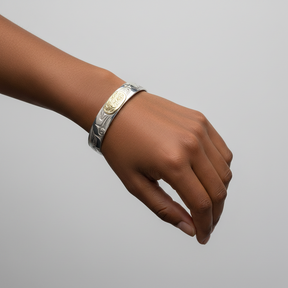 Cuff bracelet with gold inlay