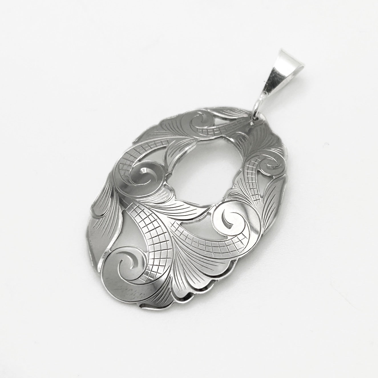 Hand Carved Floral Pendant