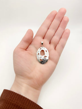 Hand Carved Floral Pendant