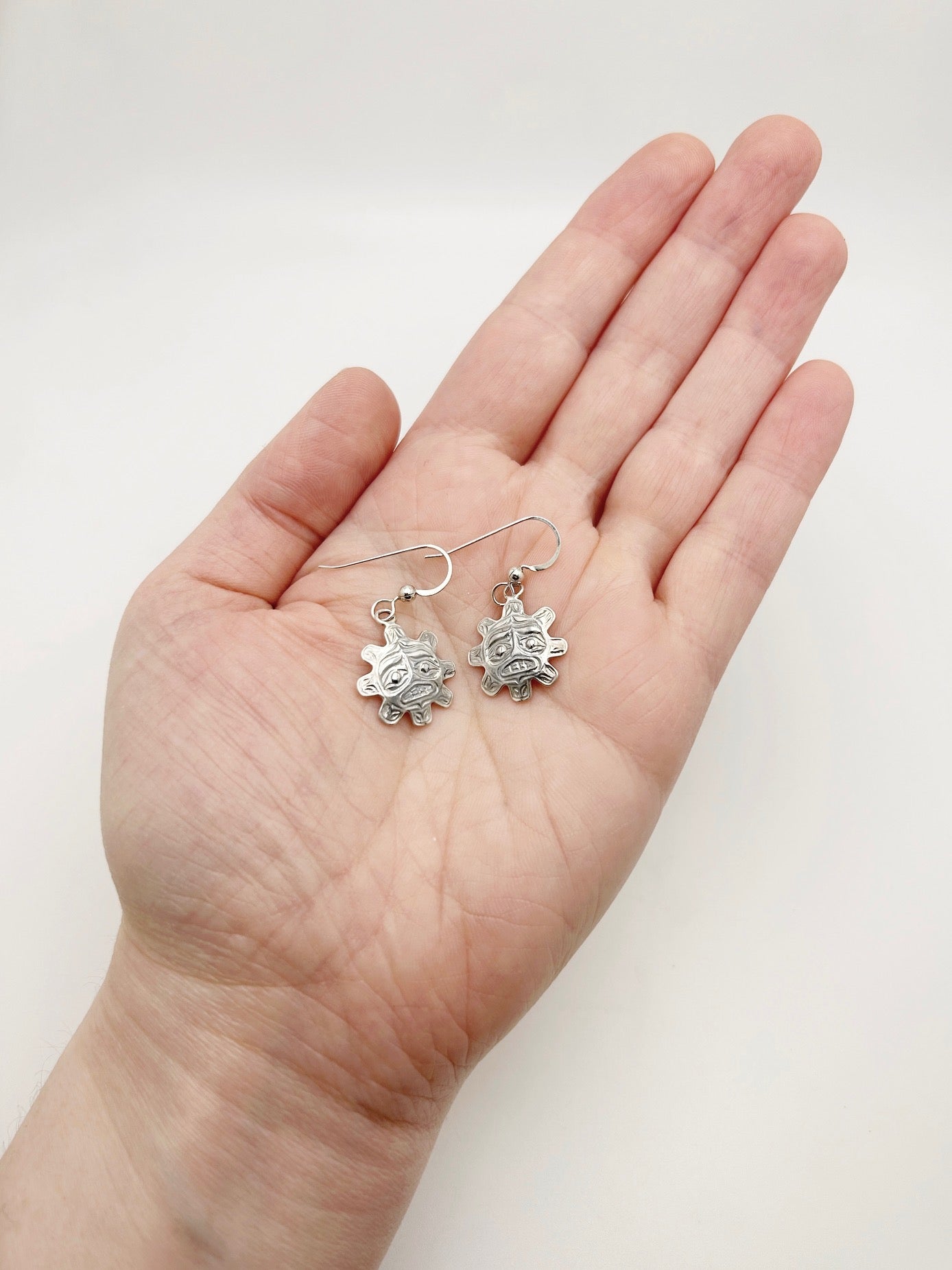 Boucles d'oreilles soleil
