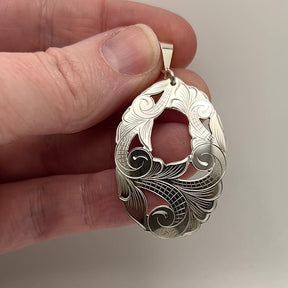 Hand Carved Floral Pendant